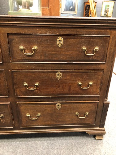 Lot 321 - A George III oak and mahogany dresser base
