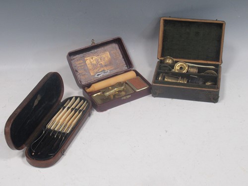 Lot 141 - A pocket-size brass and bone microscope with...
