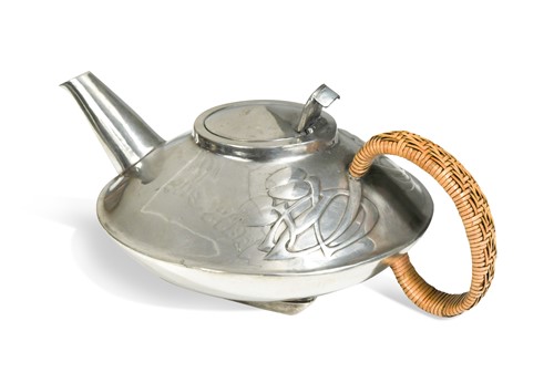 Lot 122 - Archibald Knox (1864-1933) for Liberty & Co., an Arts & Crafts Tudric polished pewter teapot