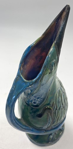 Lot 17 - C.H. Brannam for Barum Pottery, an art pottery Kingfisher jug, 1898