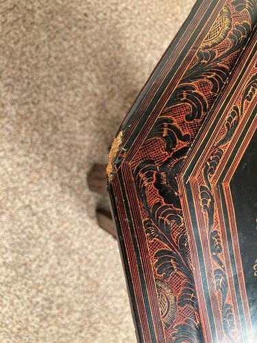 Lot 551 - A Burmese red lacquer occasional table, 20th century
