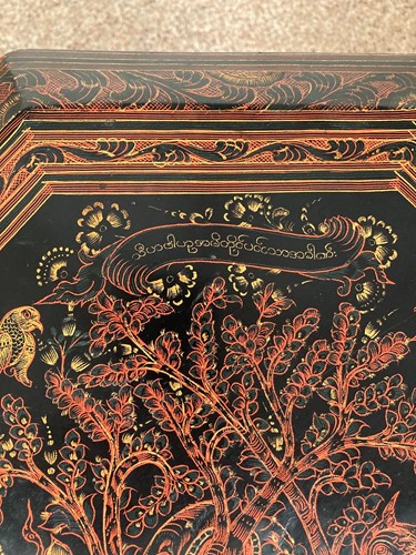 Lot 551 - A Burmese red lacquer occasional table, 20th century