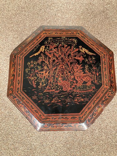 Lot 551 - A Burmese red lacquer occasional table, 20th century