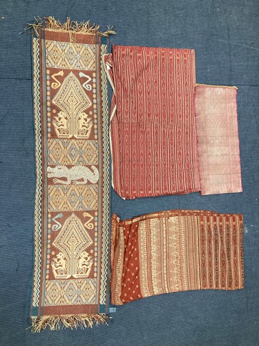 Lot 558 - Four Indonesian textiles, to include one...