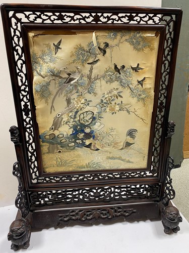 Lot 58 - A Chinese carved hardwood fire screen, Qing Dynasty, mid 19th century