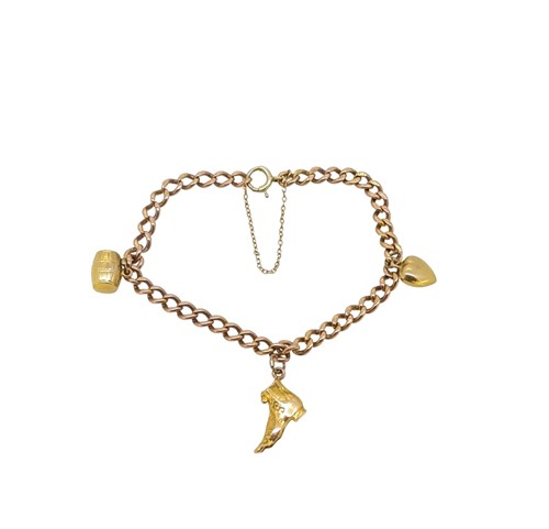 Lot 62 - A 9ct gold charm bracelet