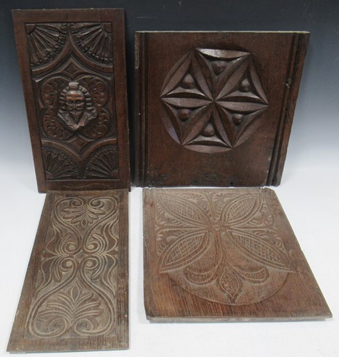 Lot 125 - Four carved oak panels, 19th century, 46 x...