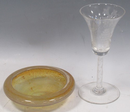 Lot 49 - A wine glass with an engraved trumpet bowl, on...