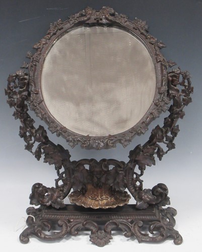Lot 531 - A cast iron tabletop mirror, with lower tray...