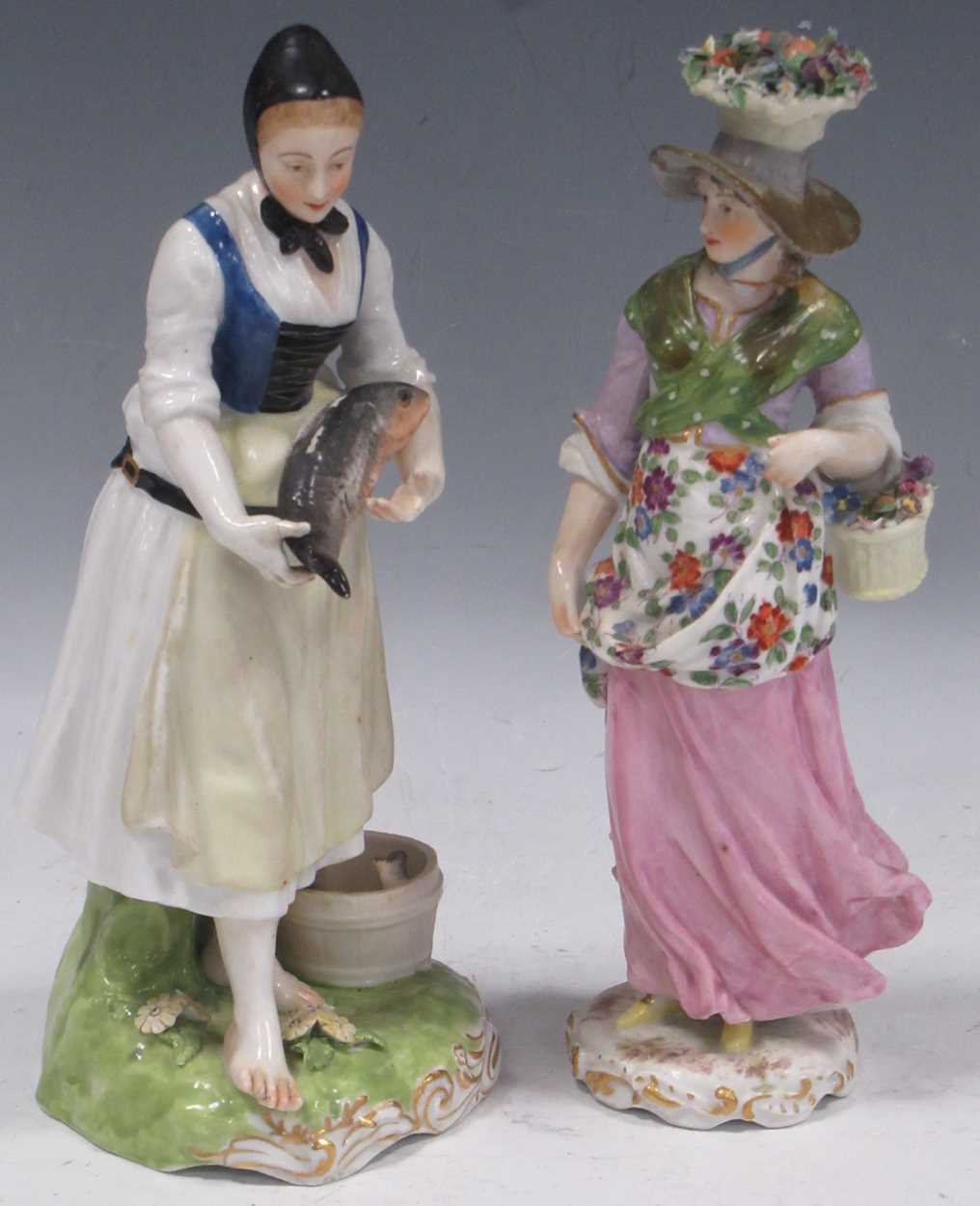 Lot 39 - A German porcelain figure of a lady with a...