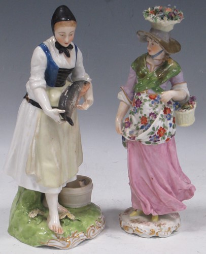 Lot 39 - A German porcelain figure of a lady with a...