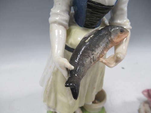 Lot 39 - A German porcelain figure of a lady with a...