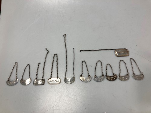 Lot 212 - A collection of 8 silver ‘noggin’ spirit...