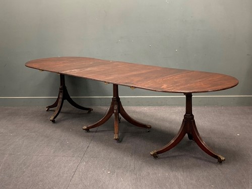 Lot 460 - A Regency style mahogany triple pedestal...