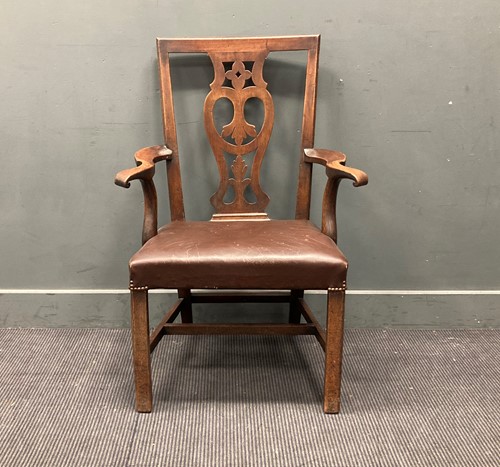 Lot 464 - A late George III mahogany armchair retailed...