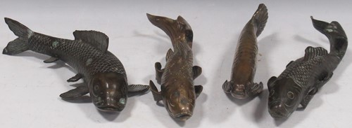 Lot 94 - Four Chinese bronzed metal models of carp,...