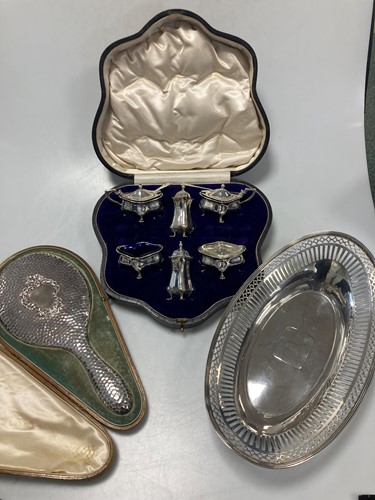 Lot 198 - A cased silver 6-piece cruet set together with...
