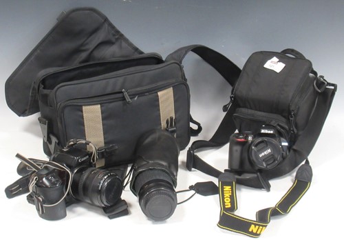 Lot 121 - Two 35mm cameras with lenses comprising