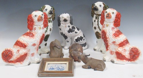 Lot 96 - A group of Staffordshire dogs, tallest 33.5cm...