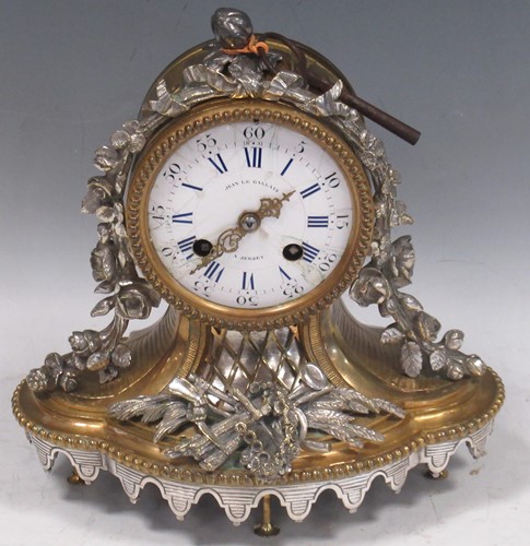 Lot 140 - A late 19th century gilt metal mantel clock by...
