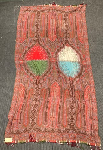 Lot 569 - A Paisley shawl, 295 x 155cm