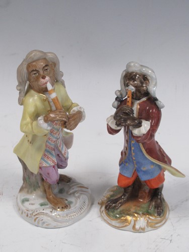 Lot 104 - A Berlin monkey band figure and a continental...