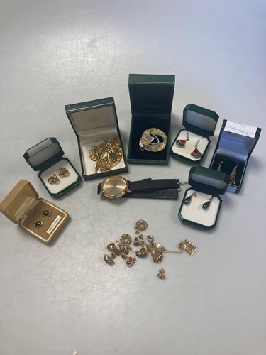 Lot 175 - Eight pairs of earrings and a St.Christopher...