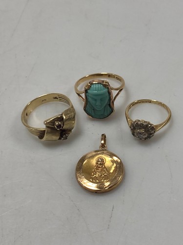 Lot 149 - A religious pendant tested as 18ct gold, a...