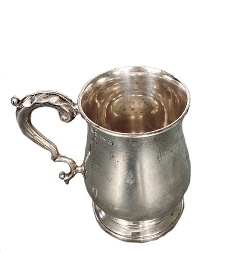 Lot 542 - A George V silver christening mug
