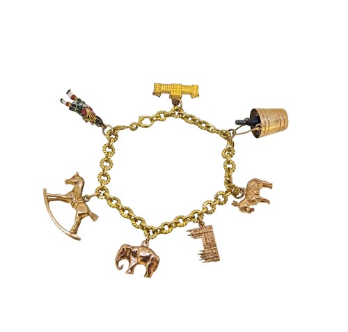 Lot 96 - A late 20th century charm bracelet