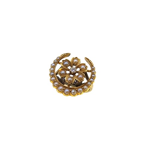 Lot 69 - A floral crescent ring