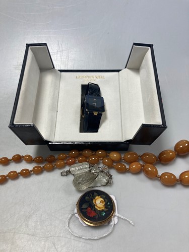 Lot 168 - A string of amber beads, a paste necklace, a...