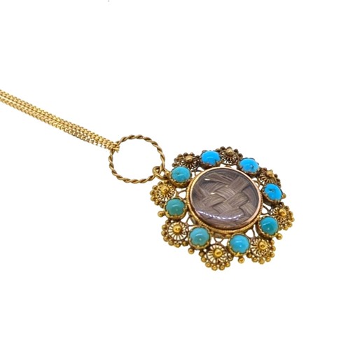 Lot 117 - A 19th century turquoise pendant with a modern chain