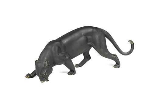 Lot 72 - A dark patinated model of a prowling panther