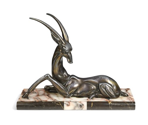 Lot 73 - An Art Deco patinated zamac model of an antelope