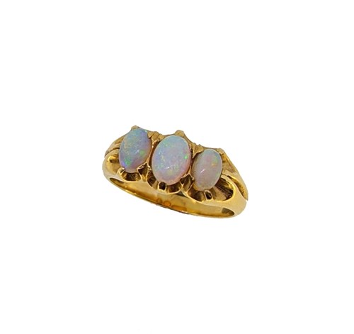 Lot 108 - An opal three stone ring