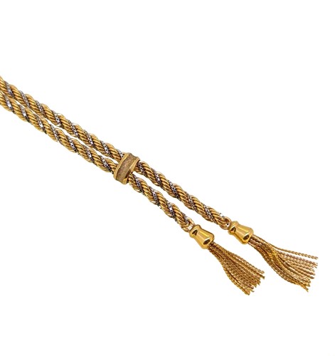 Lot 244 - A rope style tassel necklace