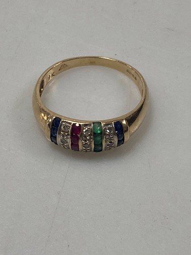 Lot 147 - A hallmarked 9ct gold multi stone set dress...