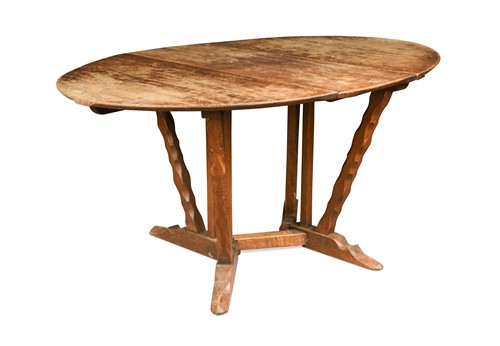 Lot 221 - Arthur Romney Green (1872-1945), an Arts & Crafts oak drop-leaf table, circa 1910