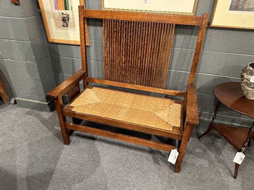 Lot 211 - Leopold and John George Stickley, an Arts & Crafts 'Mission' oak hall bench, designed 1906