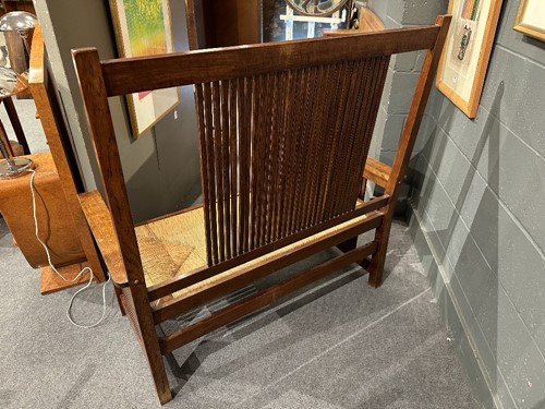 Lot 211 - Leopold and John George Stickley, an Arts & Crafts 'Mission' oak hall bench, designed 1906