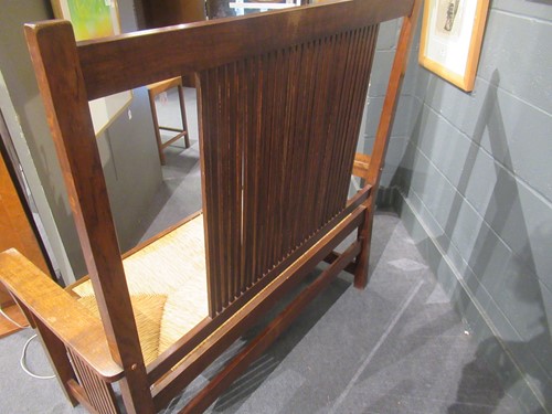 Lot 211 - Leopold and John George Stickley, an Arts & Crafts 'Mission' oak hall bench, designed 1906