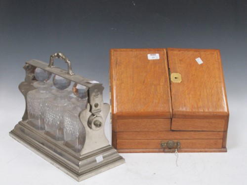 Lot 22 - An electrploated tantalus 27 x 42 x 18cm;...