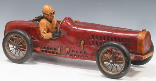 Lot 119 - A wood and resin single seater toy car, with...