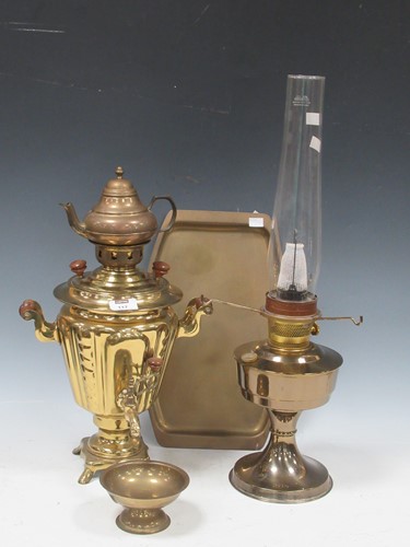 Lot 117 - A brass and glass oil lamp, together with a...