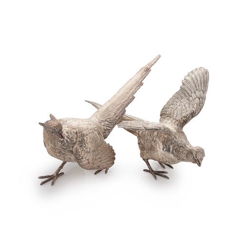 Lot 567 - A brace of Elizabeth II silver pheasants