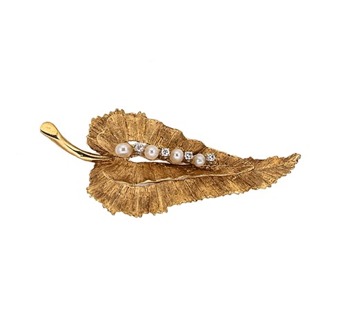 Lot 239 - A pearl and diamond leaf pendant