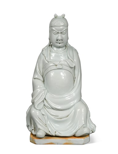 Lot 36 - A Chinese Dehua porcelain figure of Guandi, 19th/20th century