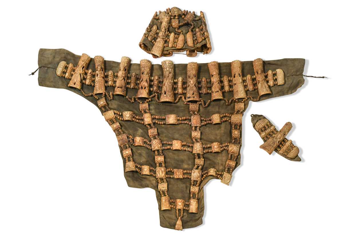 Lot 120 - A Tibetan three piece carved bone ritual
