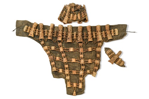 Lot 120 - A Tibetan three piece carved bone ritual apron set, probably circa 1900
